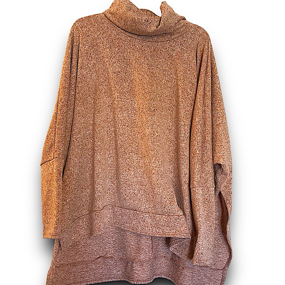 Zenna turtleneck sweater with slit sides. In excellent pre owned condition.